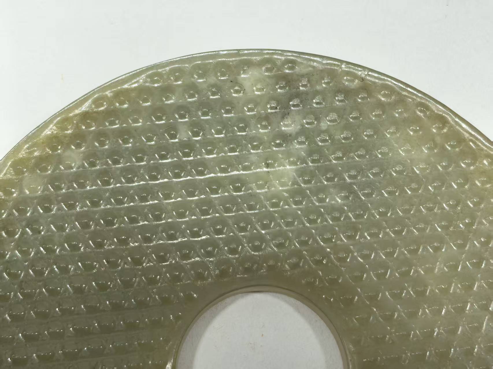 战国末期乳钉纹玉璧:承载千年礼制精神的文物瑰宝