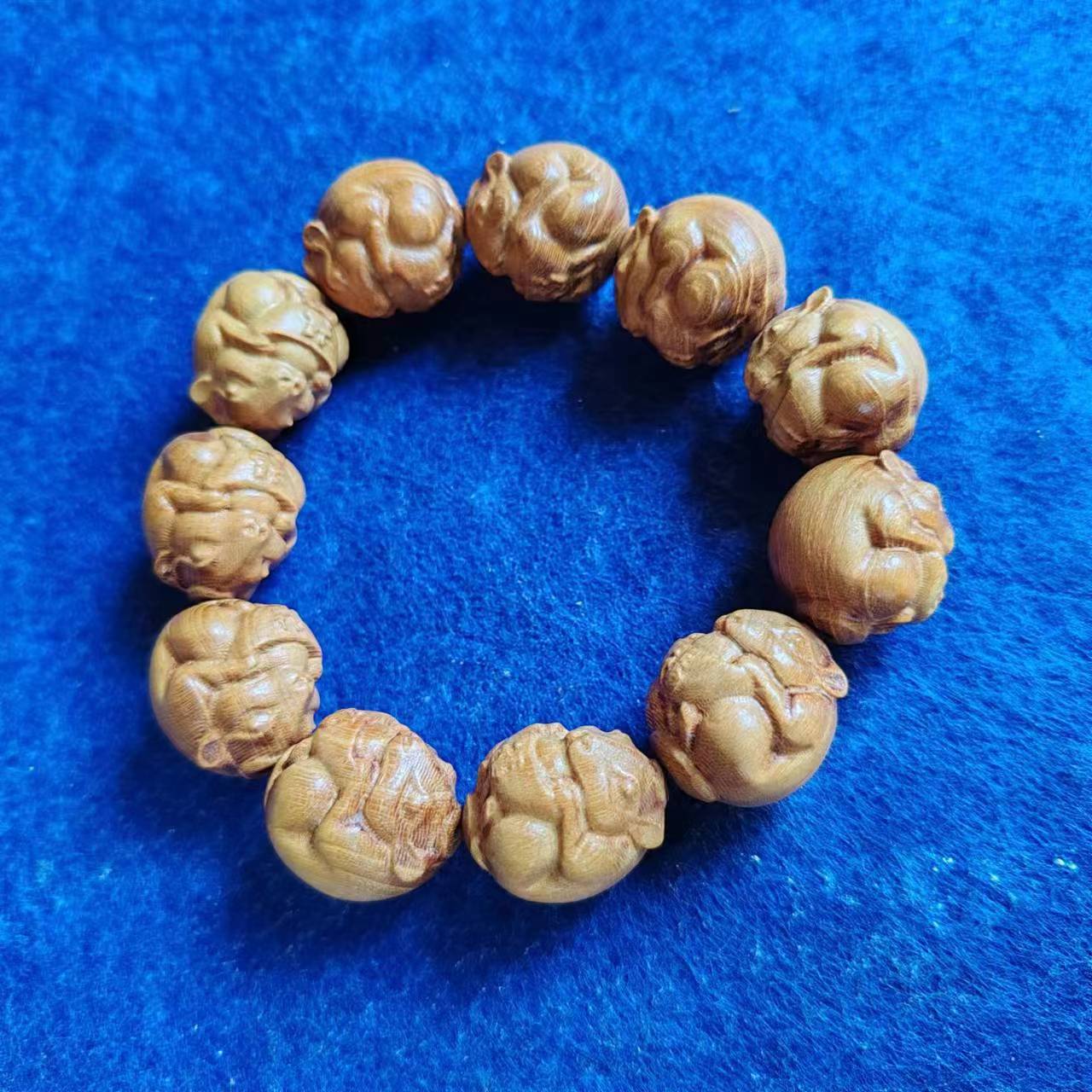 广西柘木木雕圆雕手串手把件