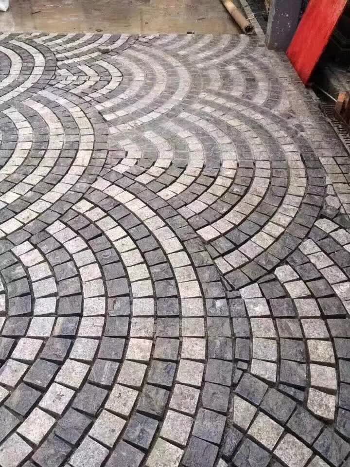 章丘黑石材马蹄石自然面多少钱一个平方