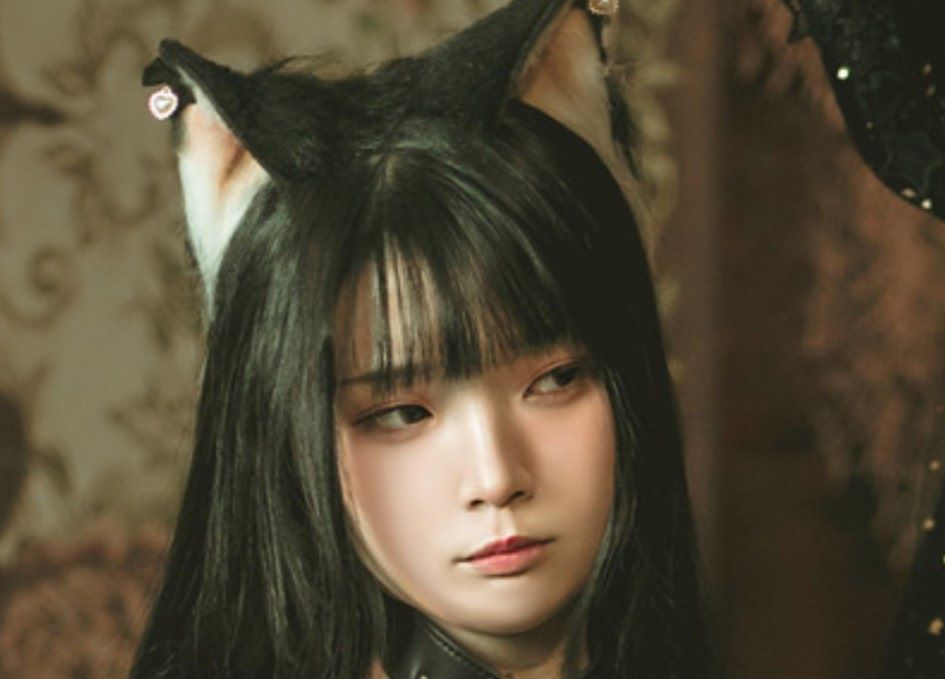 落落Raku魔女和黑猫写真图集是和谁一起拍摄的,哥特裙装的穿着
