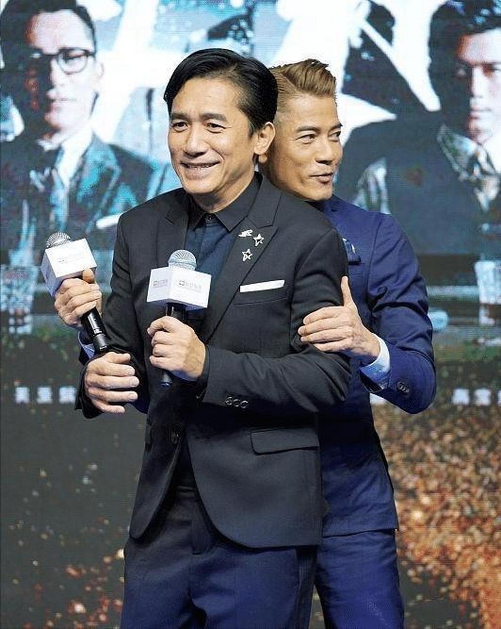 梁朝伟和郭富城同框亮相,两人身高相近,都展现出各自的魅力和自信.