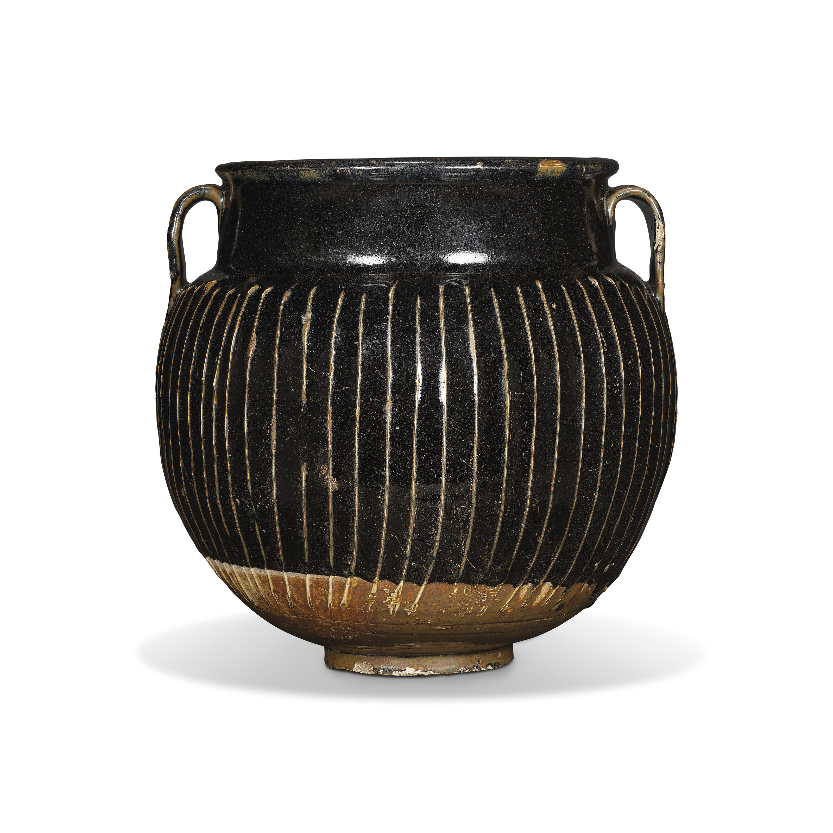 北宋/金 河南黑釉棱线纹双系罐 高:25.5厘米 成交价:22.