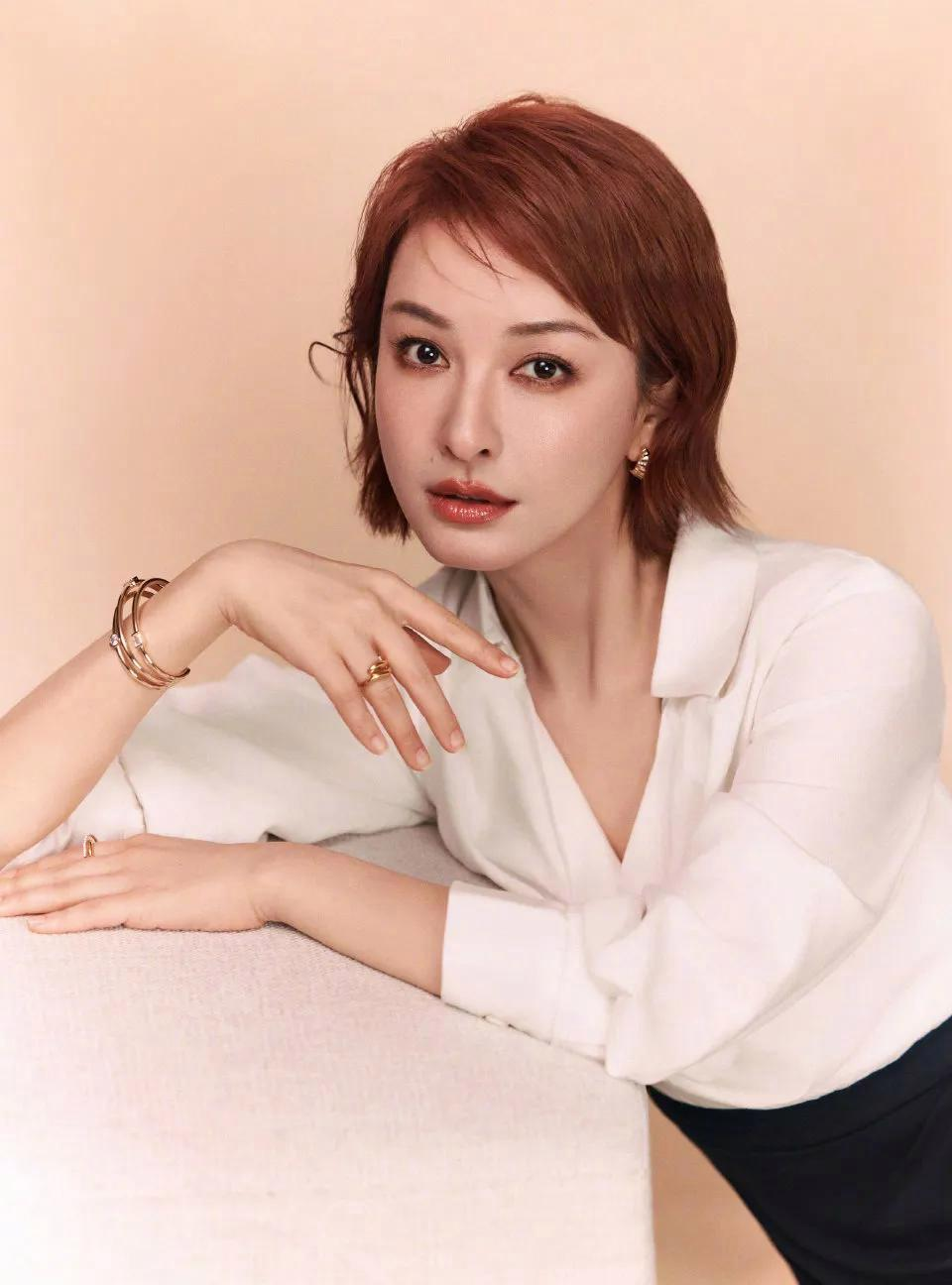 当别人还在纠结长发显脸小时,吴昕一刀剪出人生新高度!