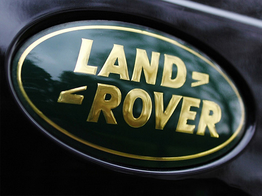 路虎汽车标志是一个绿色的椭圆形,中间是大写的"l