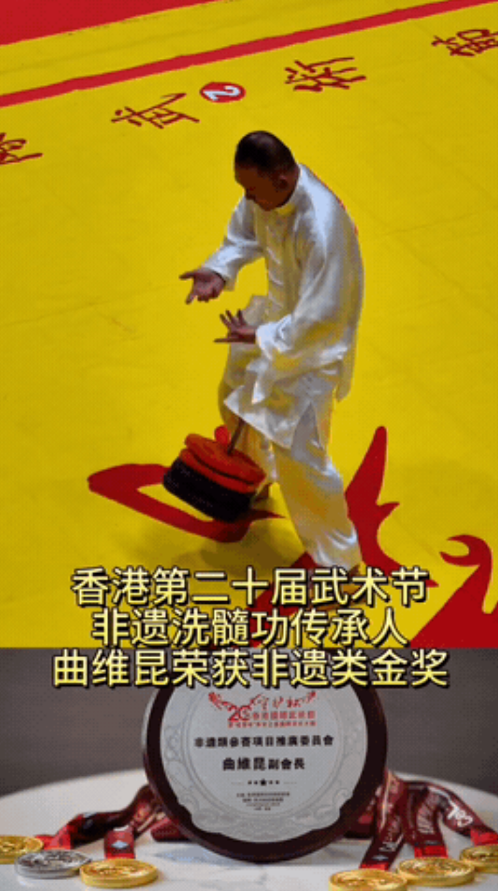 我觉得他获此殊荣完全是吊挂桶功夫潘荣兴打太极拳少林吊阴功陈小旺