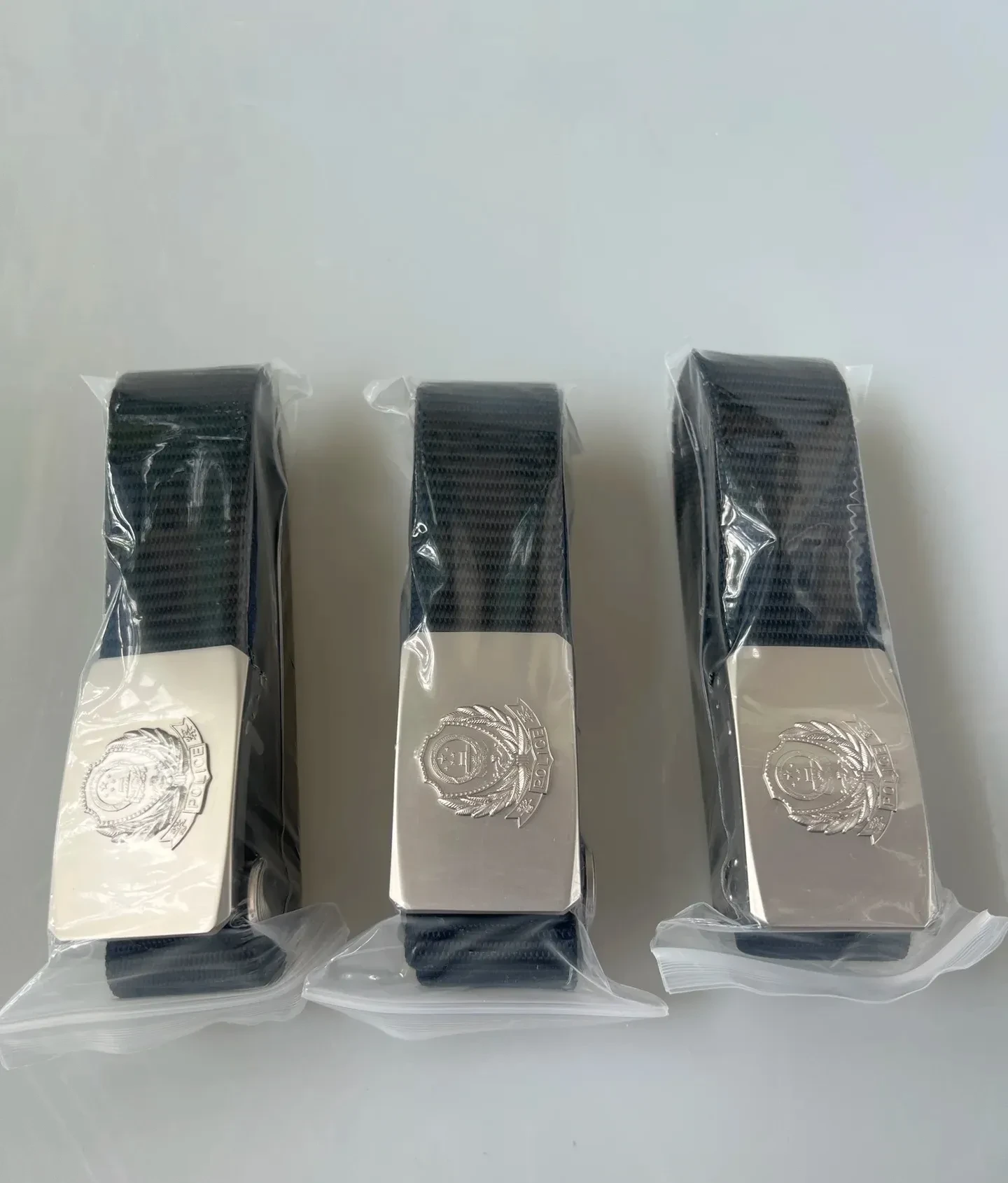 其尼龙的材质或许更加具有染醚 警察皮带头多少钱一个警察制式