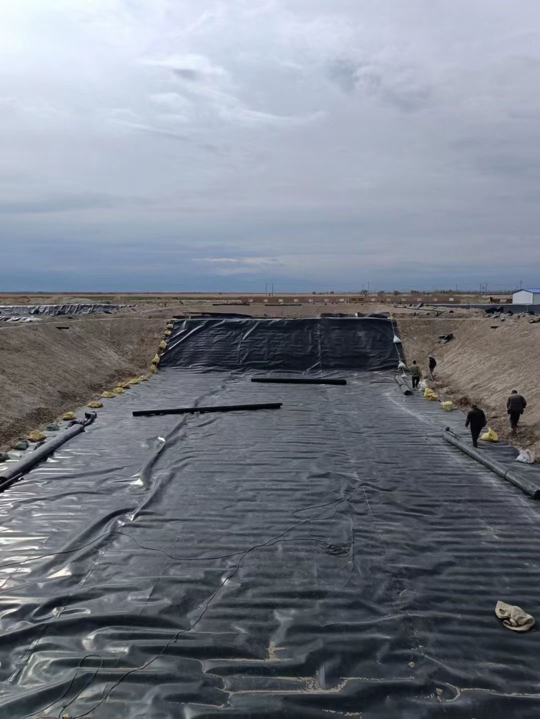 膜防水层怎么施工"hdpe(高密度聚乙烯)防渗膜 土工布"的复合防渗结构