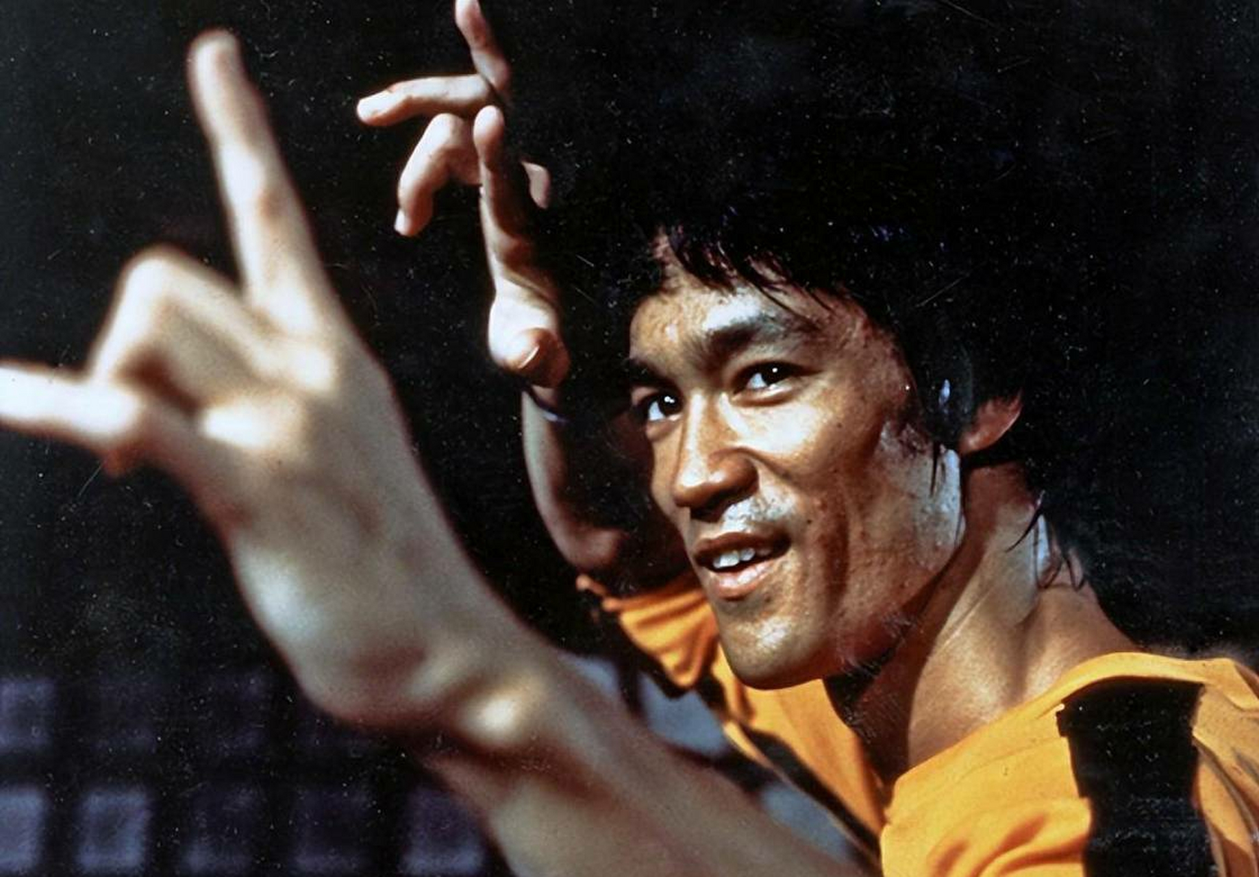 这说明李小龙认为自己最多是天下第三啊!