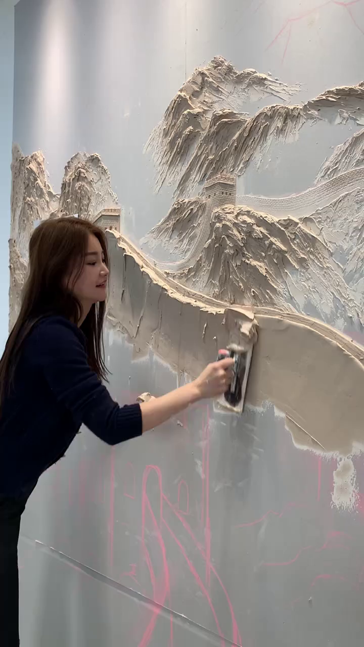 90后壁画师制作长城浮雕!