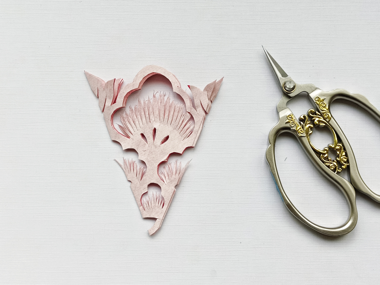 铜钱花剪纸作品