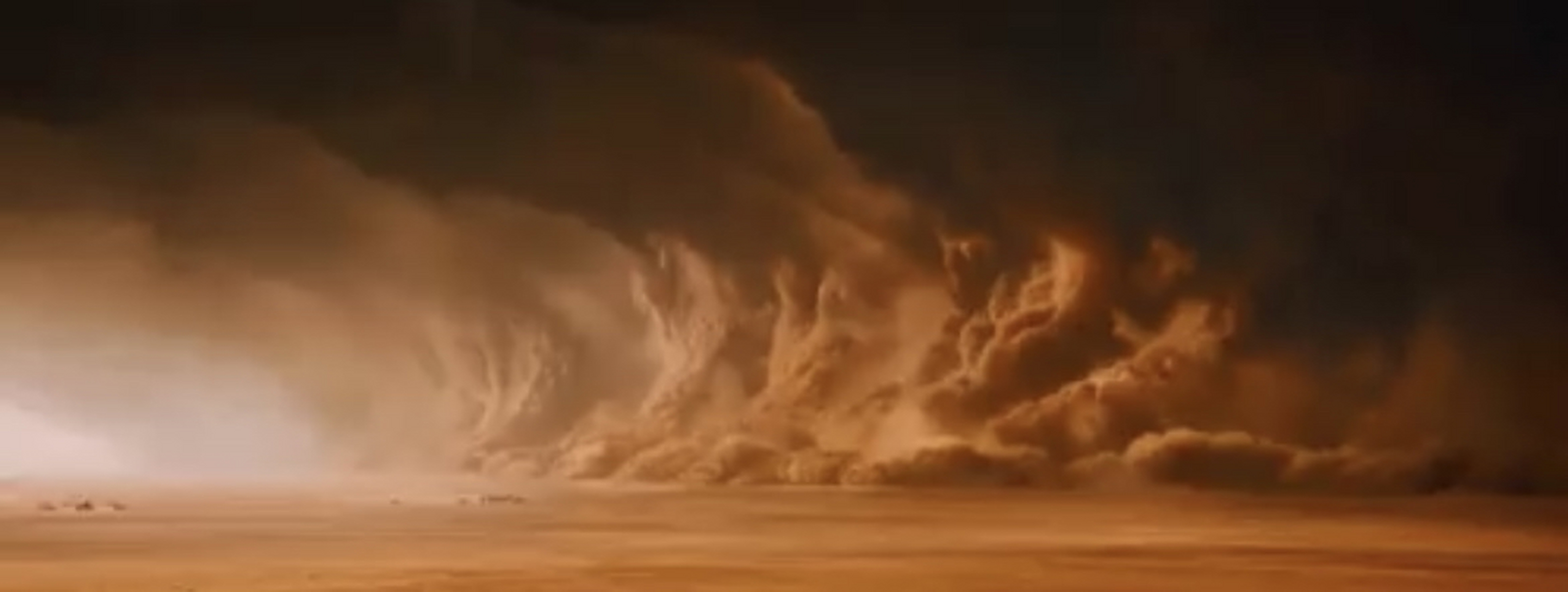 当阳光使空气变暖时,强风就会卷起并将尘埃高高地吹向天空.