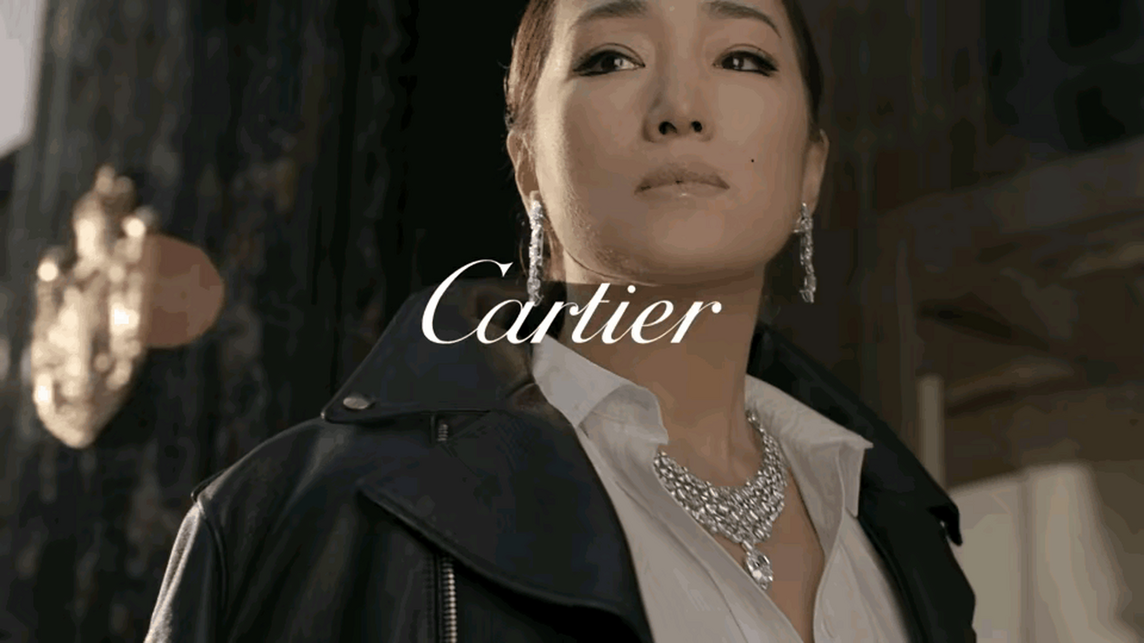 卡地亚发布一则广告片,片中作为卡地亚高级珠宝全球品牌大使的巩俐,戴