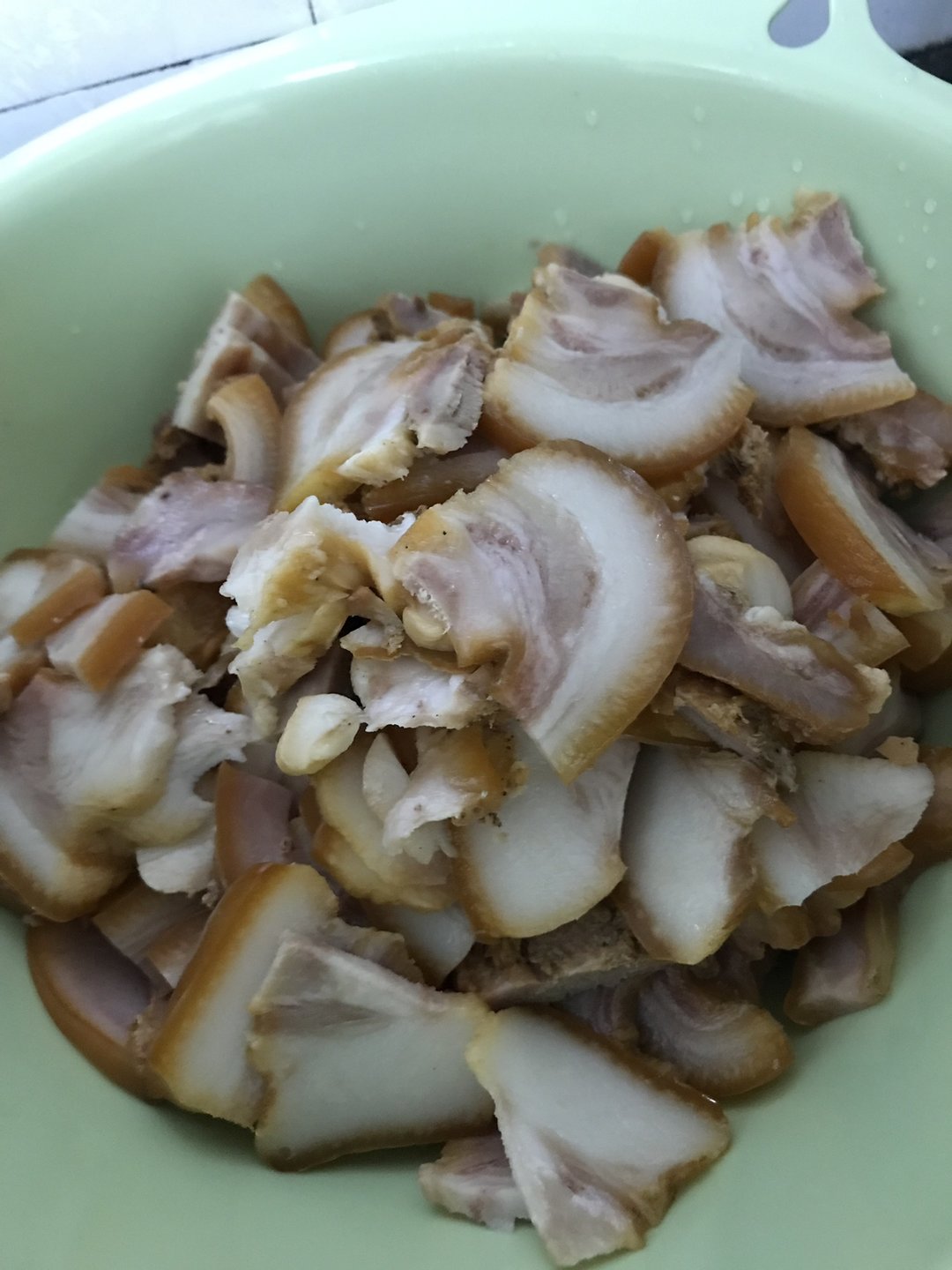 蒜苔炒猪头肉图片