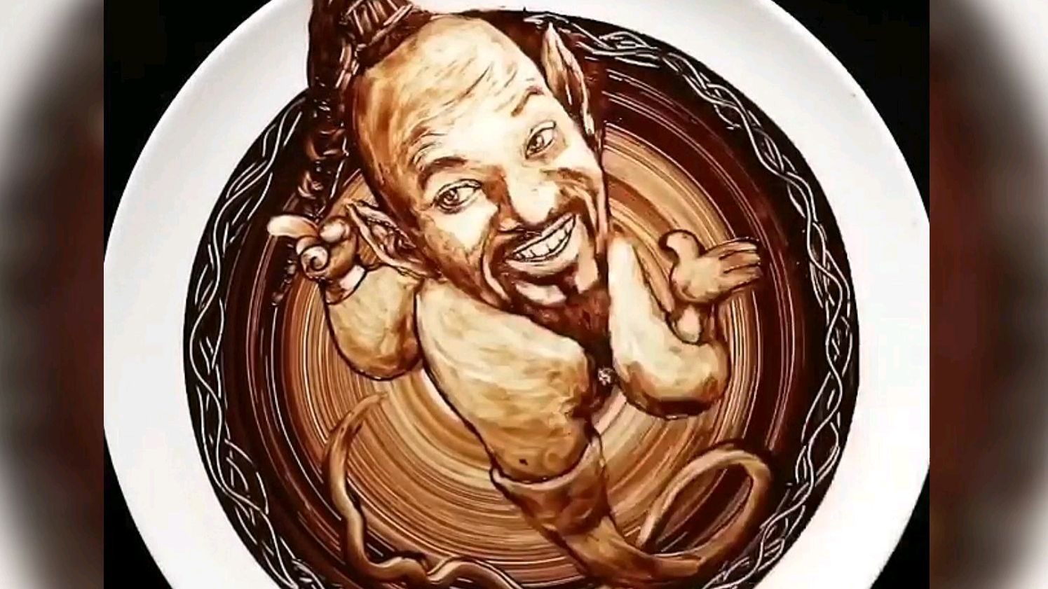 你得巧克力和我吃得不一样吧,居然能用巧克力画画,还画的这么好
