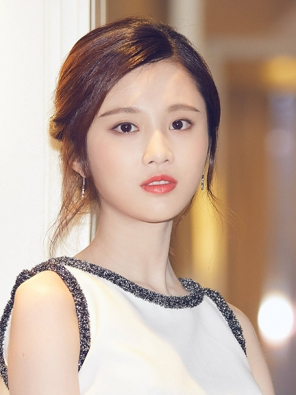 张慧雯有一张娃娃脸,有一种少女的感觉.