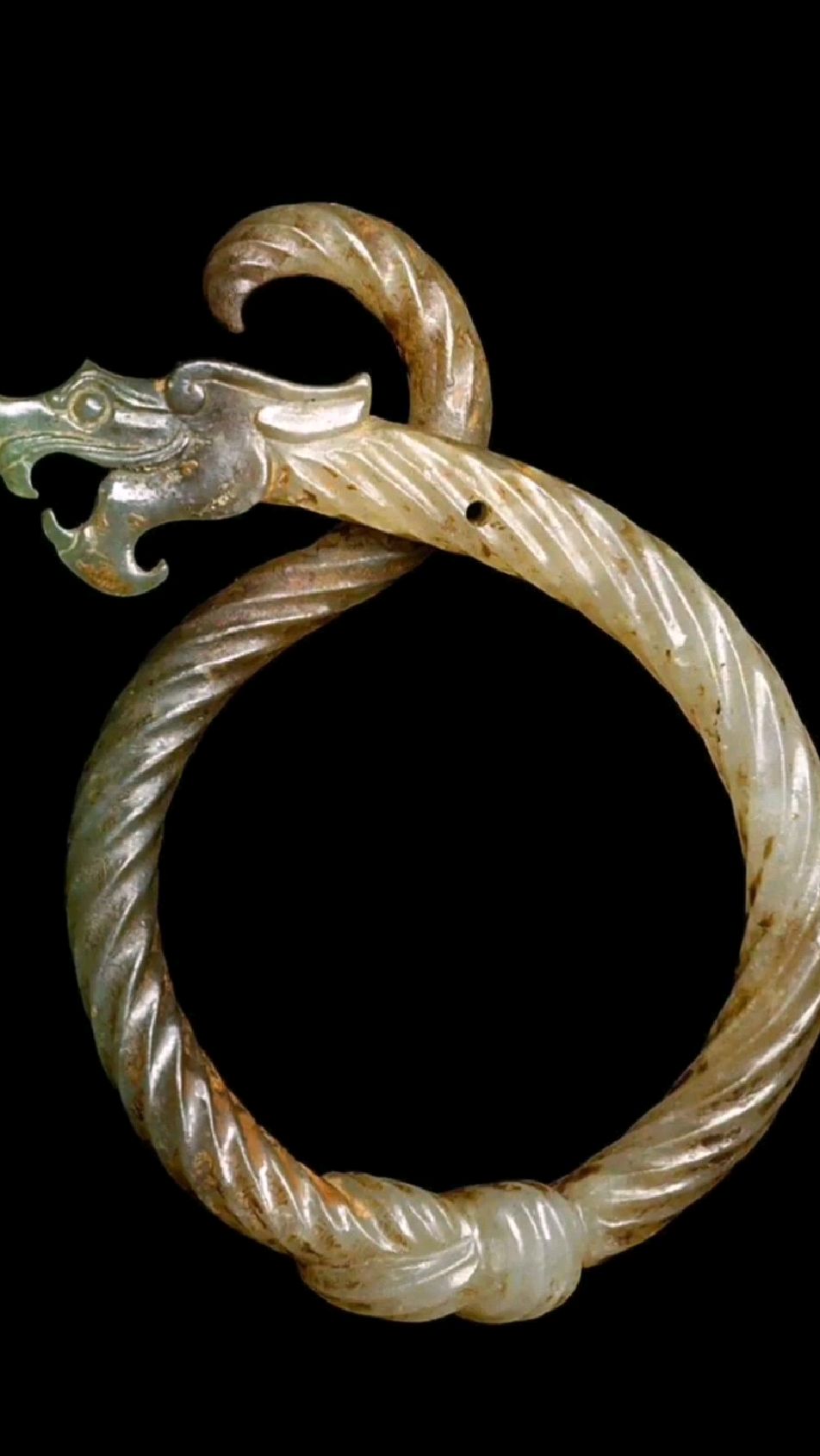 战国龙纹玉佩.现藏于美国大都会博物馆.-度小视