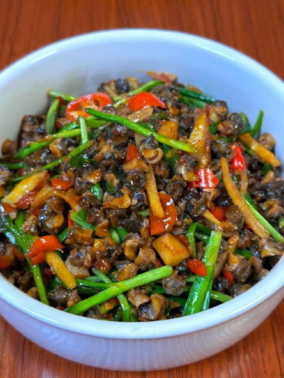 能干掉几碗饭的香辣爆炒螺蛳肉|||今天分享一道时令小炒,韭香香辣螺蛳