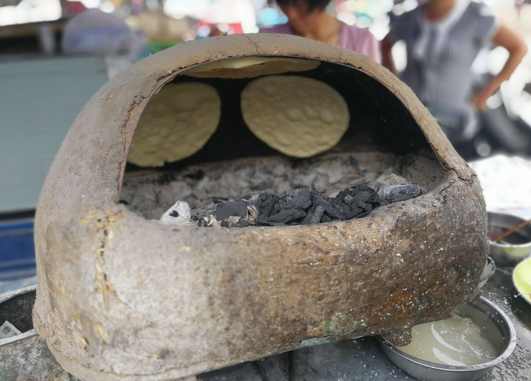 地方俗语"常赶集,还怕看不见打火烧地"是啥意思?啥美味儿?