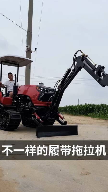 拖履带拖拉机前面安装旋转抓头推土铲也可加装挖掘机铲斗装载机铲斗