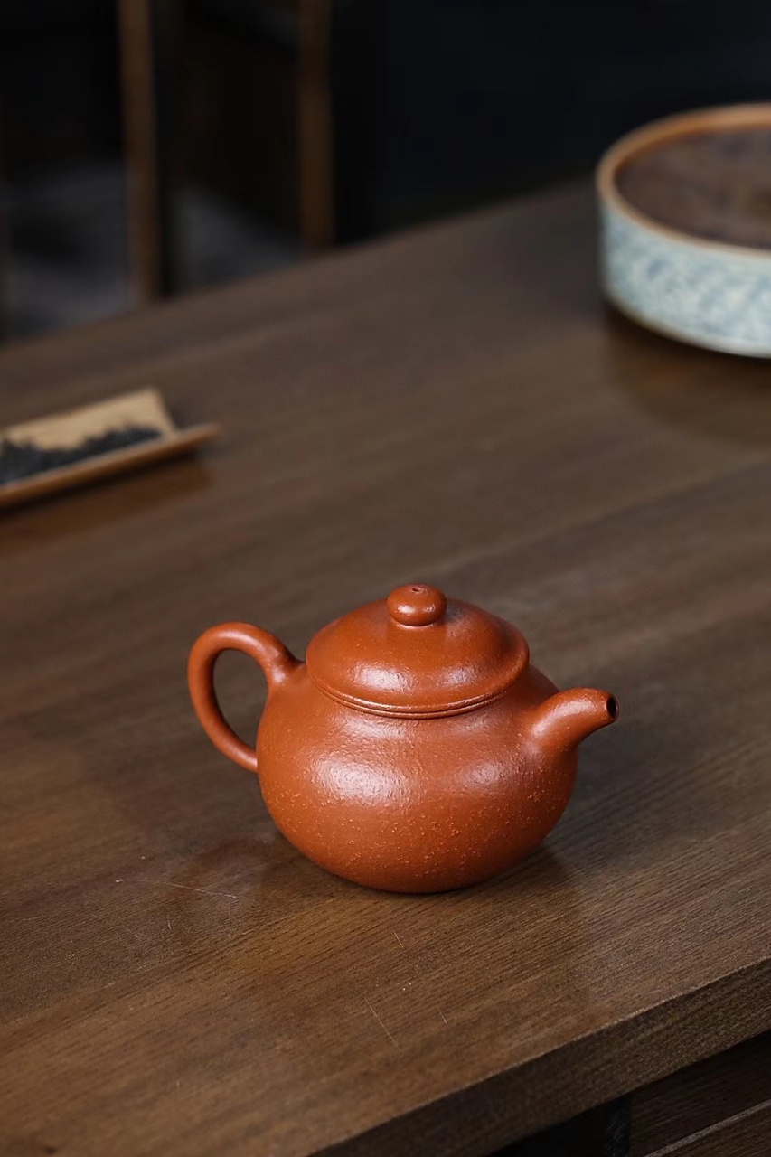 明代问世.一说取象形,另说由古时南方煮莲子粥所用的莲子罐演化.