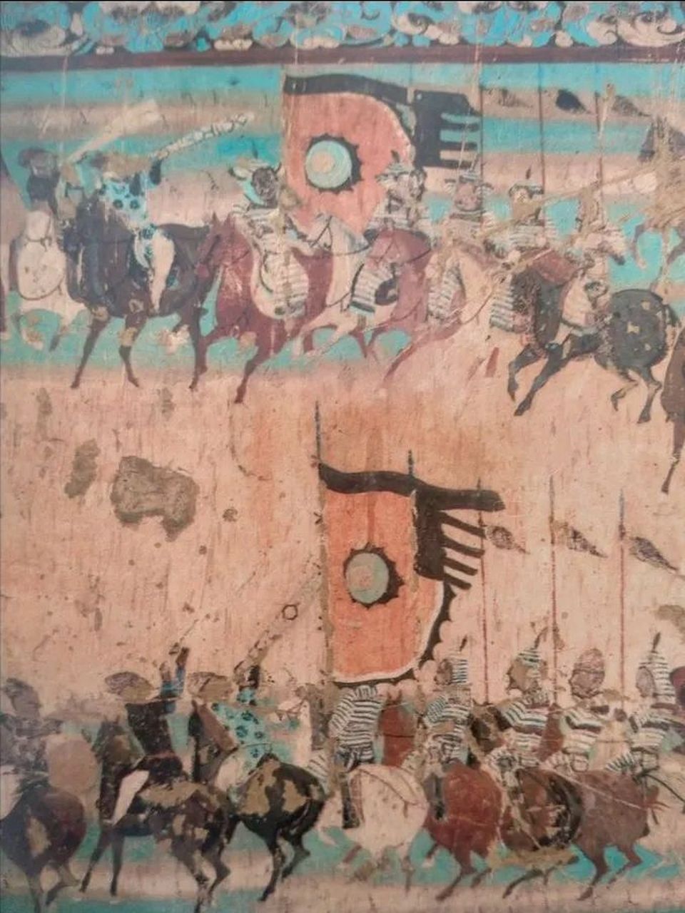 大唐军旗  这个是敦煌的壁画《张议潮出行图》,至少说明唐代末年在