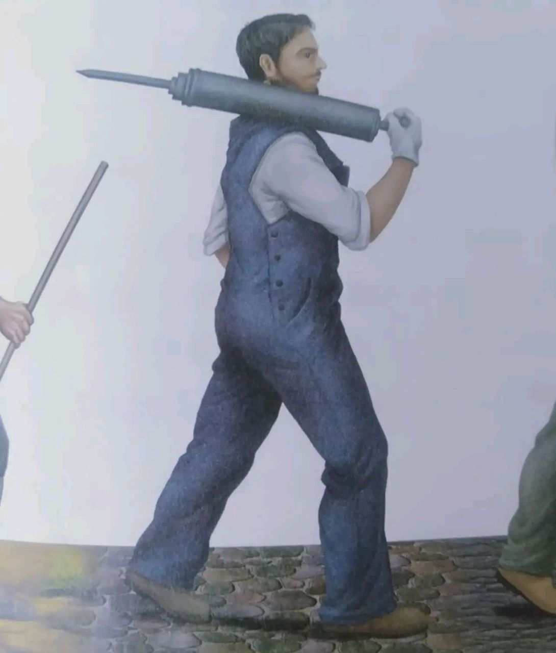 谁知道初中生物课本的这幅插图中,这个男人扛着的东西是什么吗?