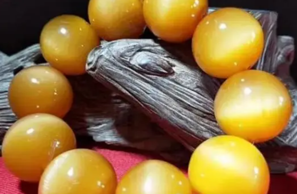 真假黄金甲手串区别