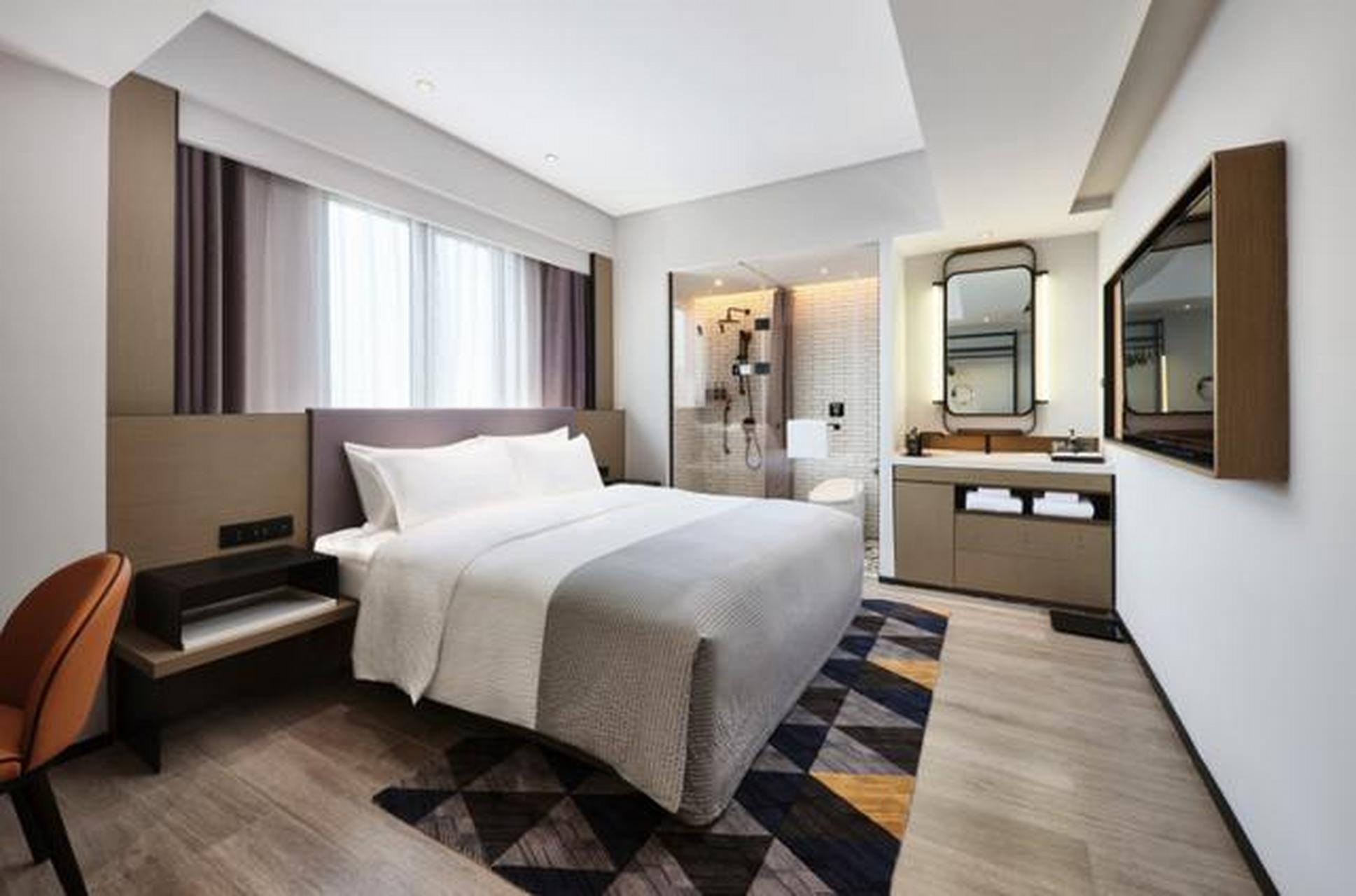 万达美华酒店位于长治市潞州区英雄北路潞鼎九号院16号楼(近万达广场)