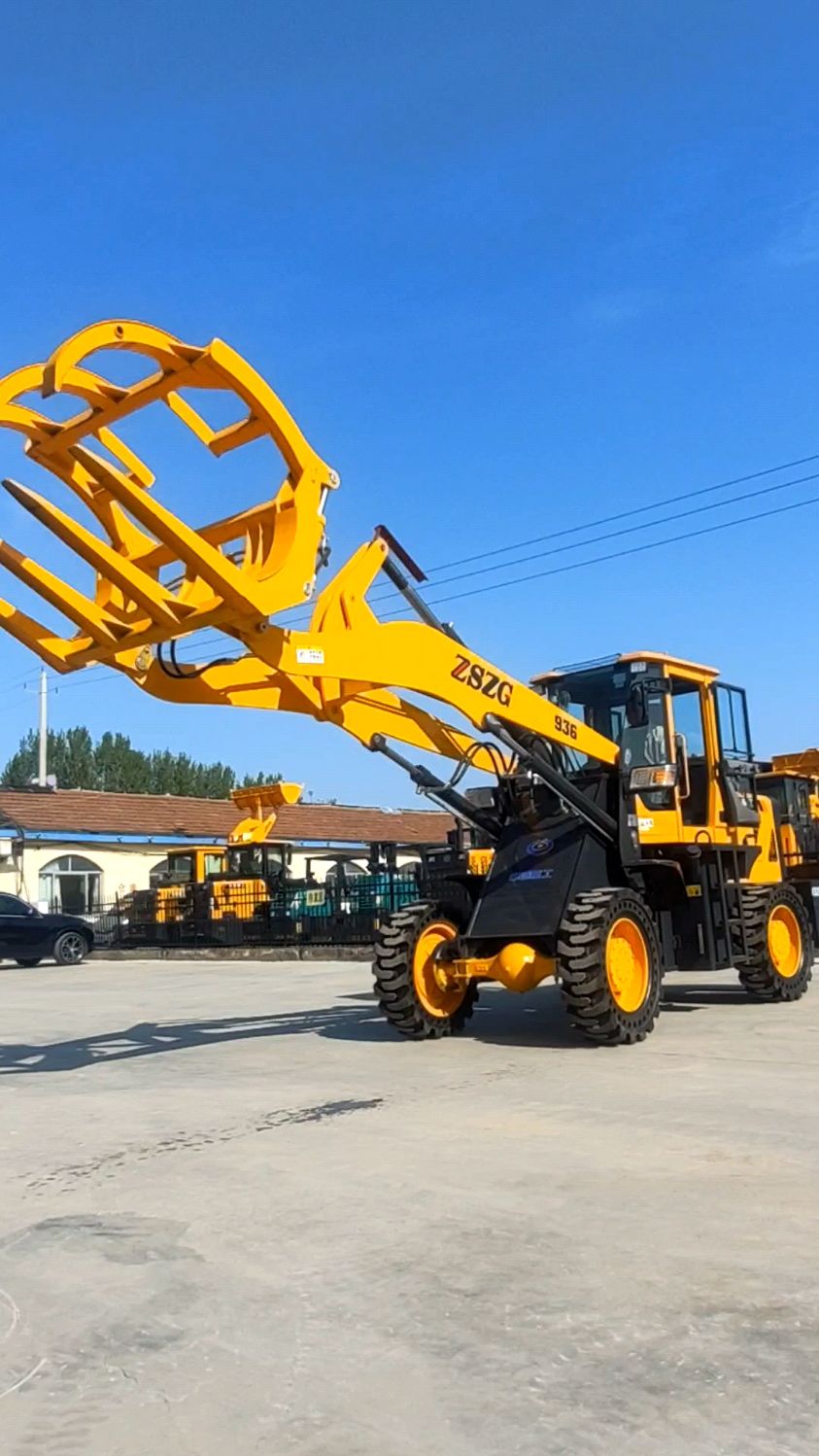 936抓木机实心胎卸料高度5米带铲斗,可用来抓铁,木材,甘蔗,钢管等