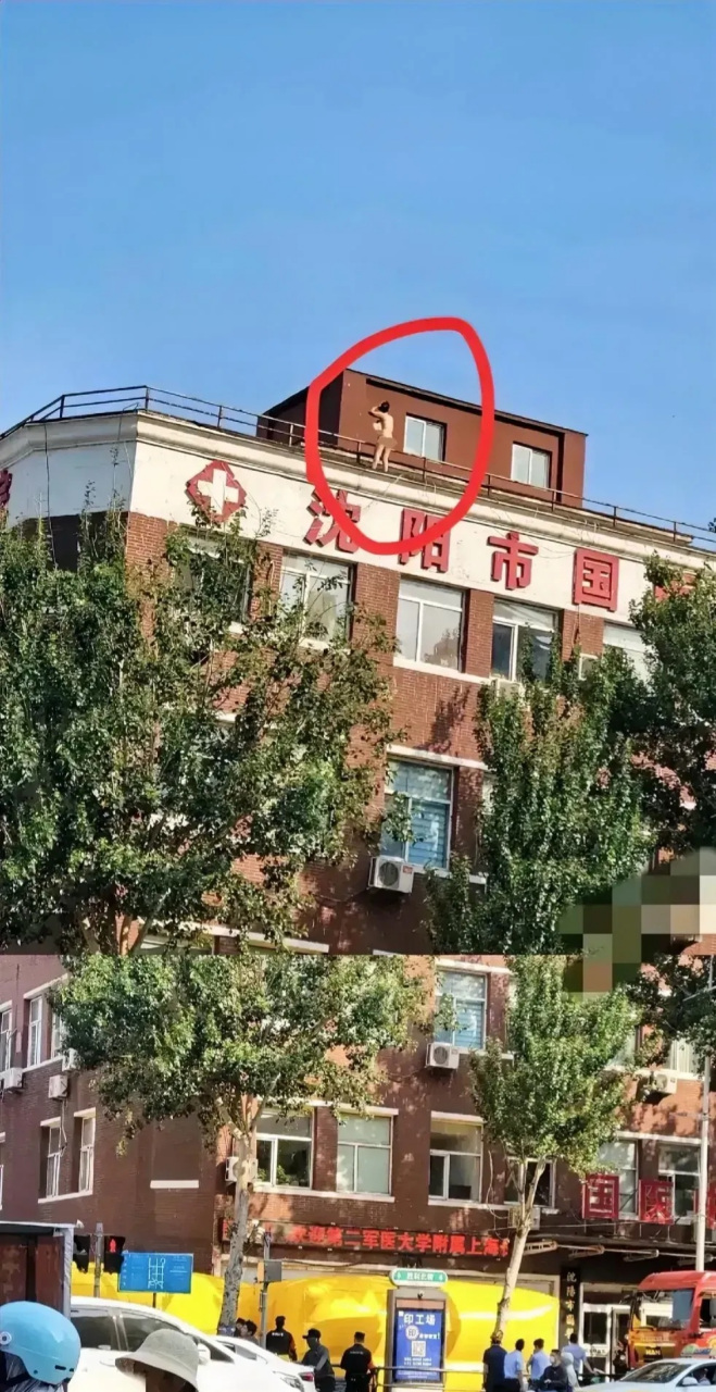 今天上午,一位女子在沈阳市沈阳火车站站东广场附近的一座楼顶徘蛔排