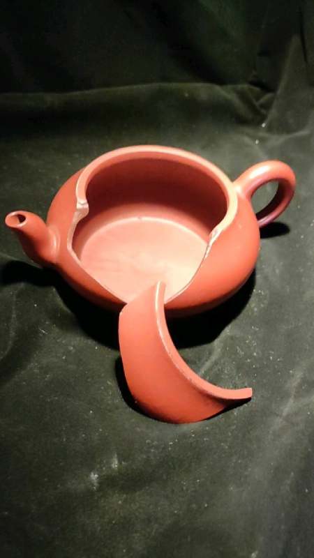 锔瓷手艺修复之无胶锔钉锔合紫砂壶片滴水不漏