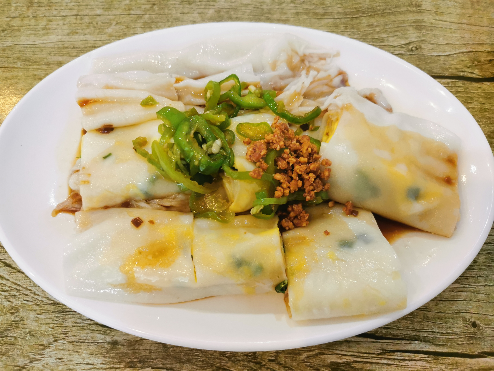 周末早起,就是为了这一口簸箕肠粉,路边摊的早餐更好吃.