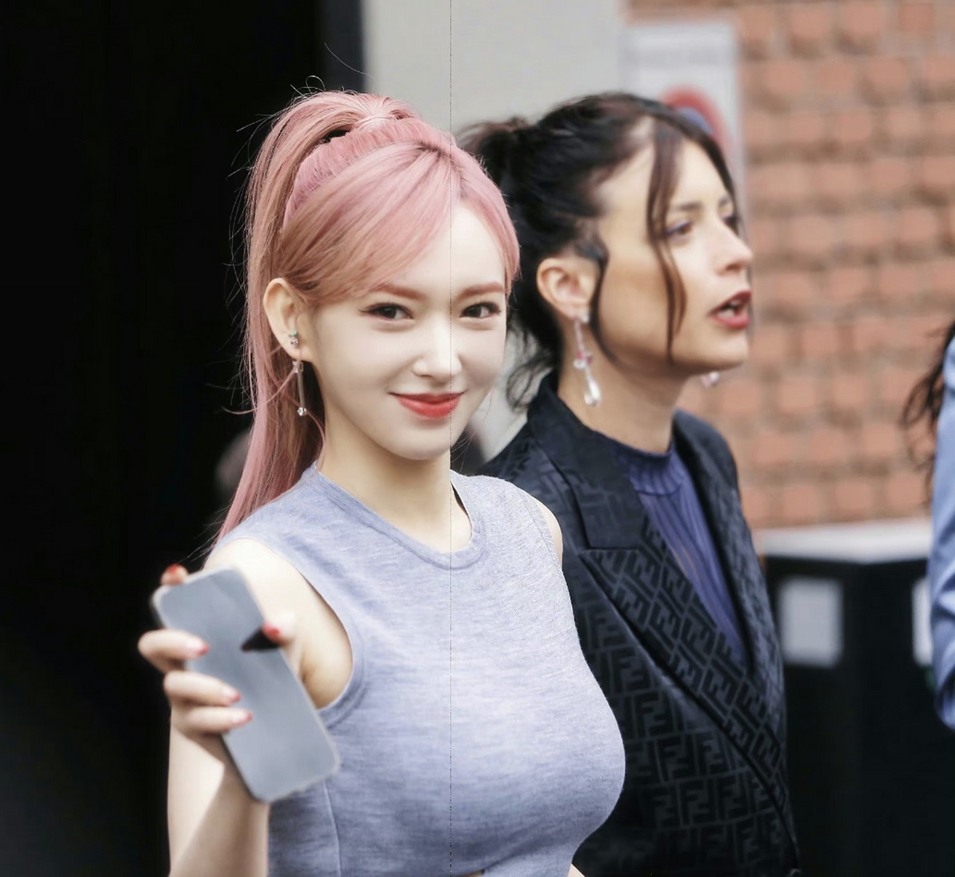 程潇,染的头发颜色有点独特,似黄似红似粉,不管什么颜色配上她白皙