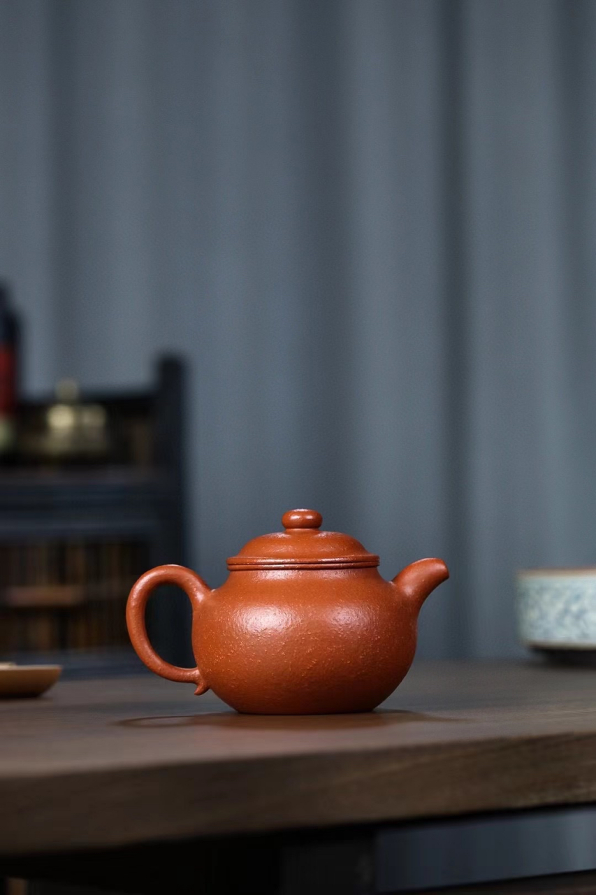 明代问世.一说取象形,另说由古时南方煮莲子粥所用的莲子罐演化.