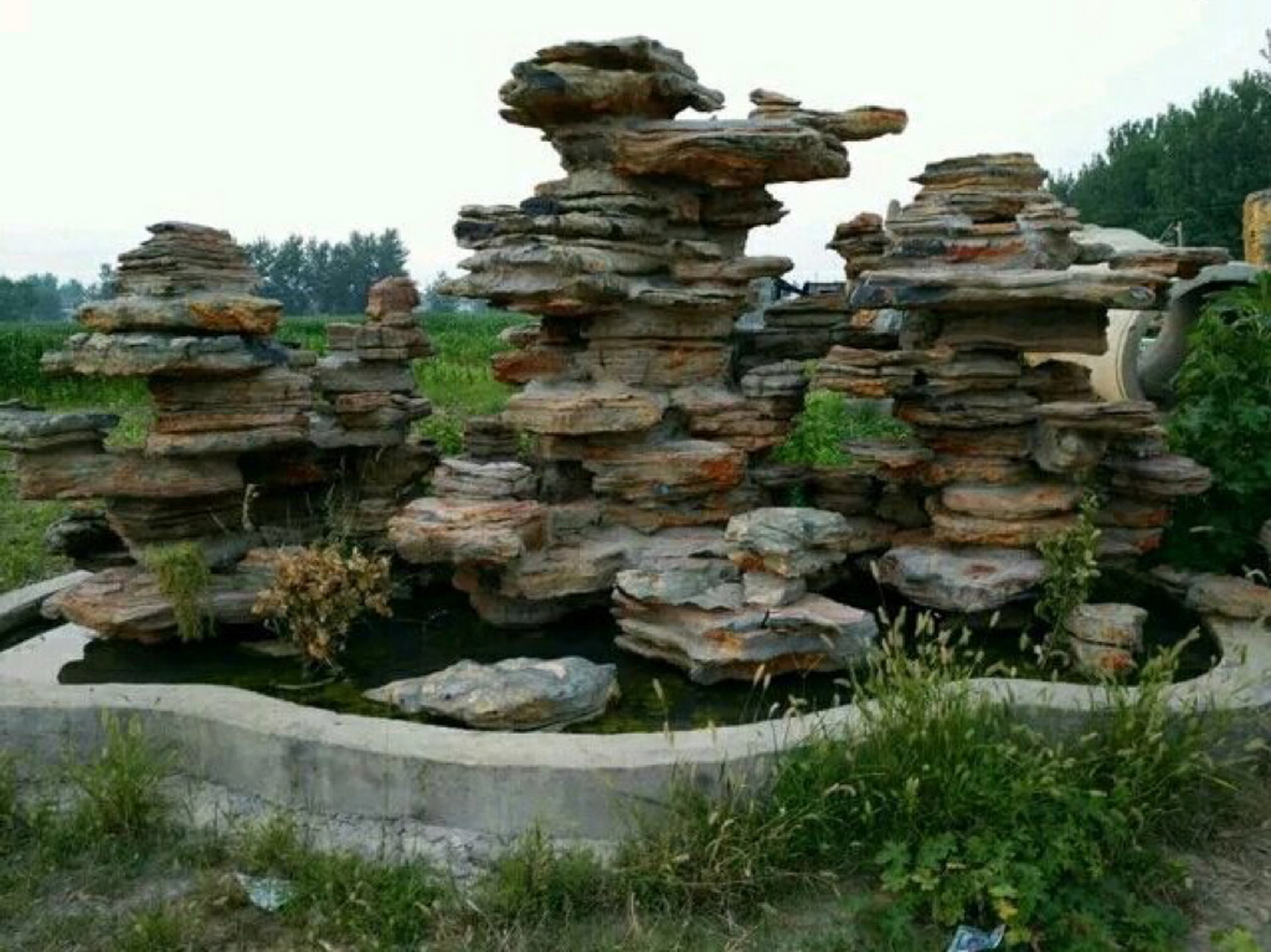 善帛假山流水喷泉制作厂家 #千层石假山厂家# #庭院假山# 鱼池假山