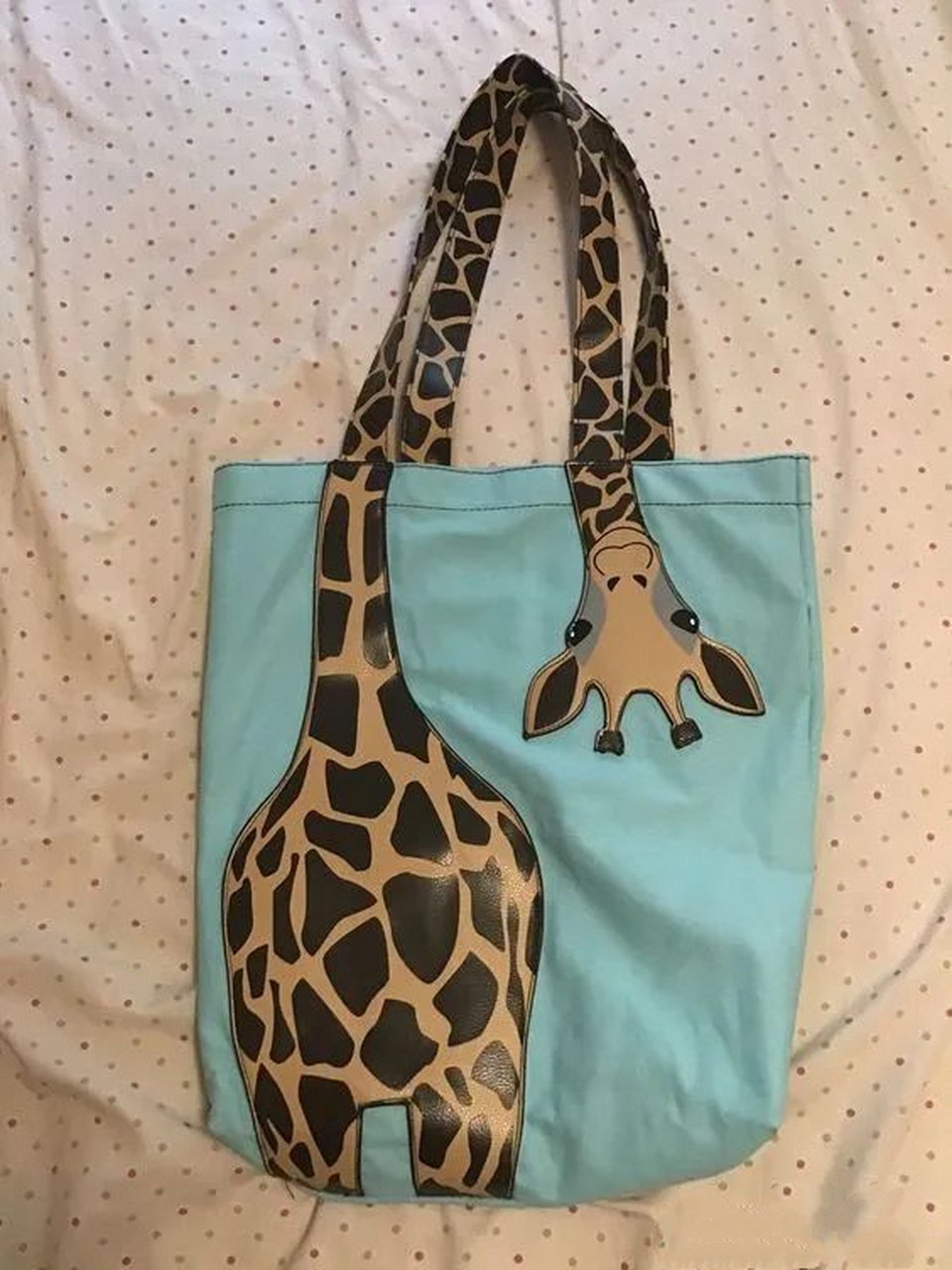 图案和手柄融为一体的创意包包,你觉得哪一款最有特色?