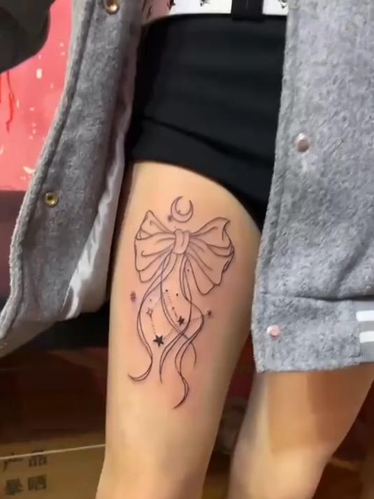 蝴蝶结纹大腿上效果还真不错