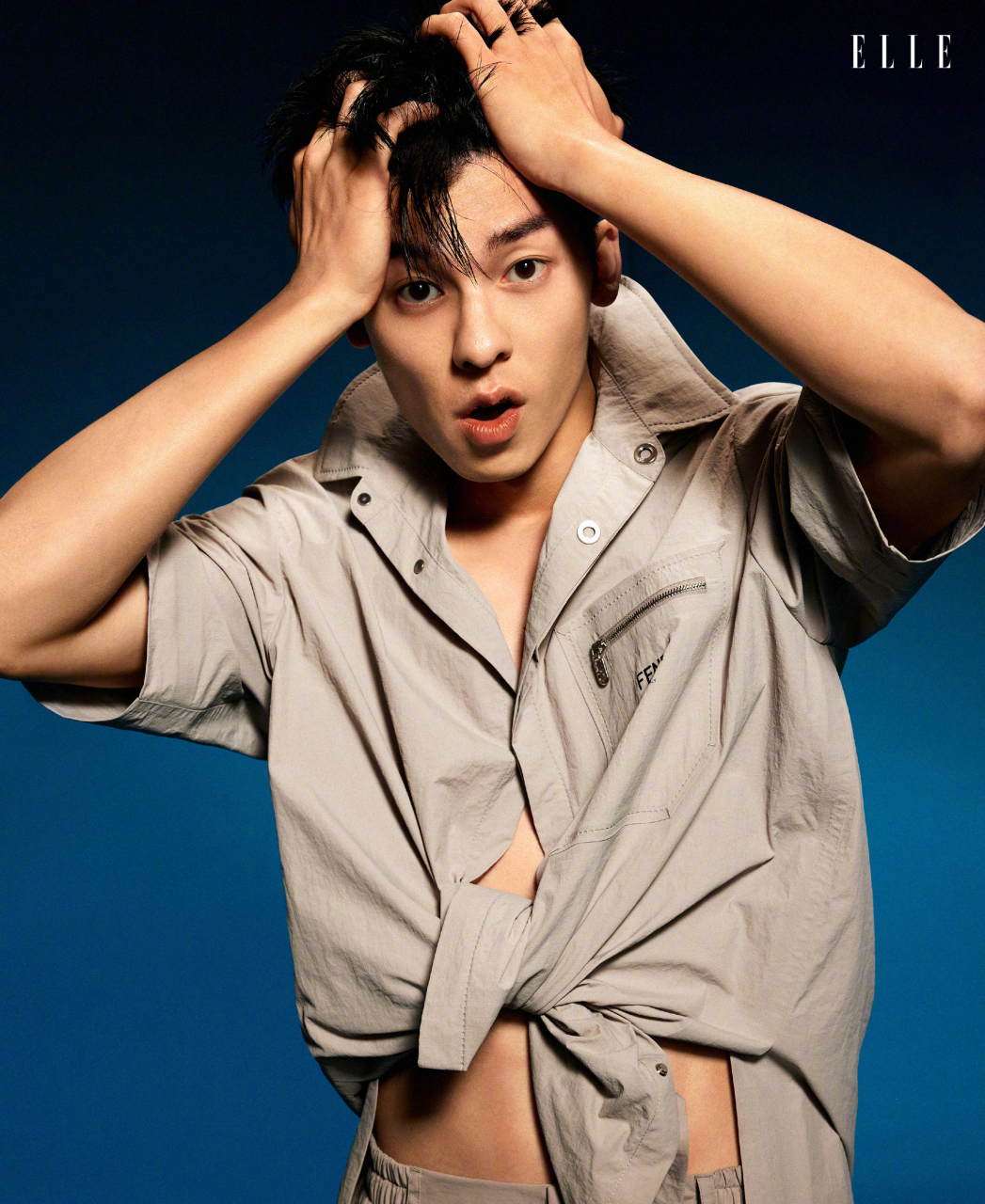 许光汉elle singapore 新加坡版6月封面人物,真空套装小露身材秀珠宝.