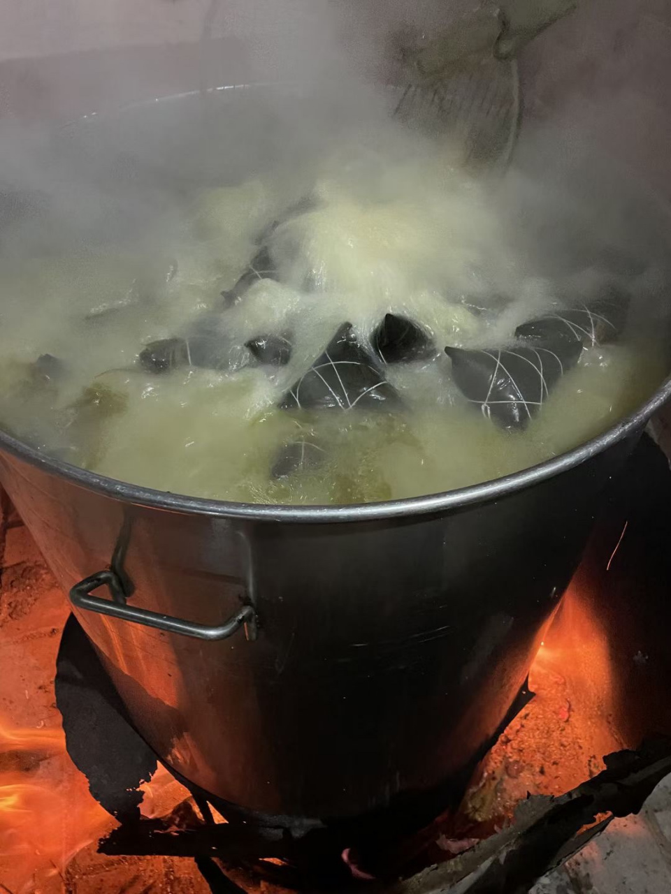 煮柴火97海胆粽子