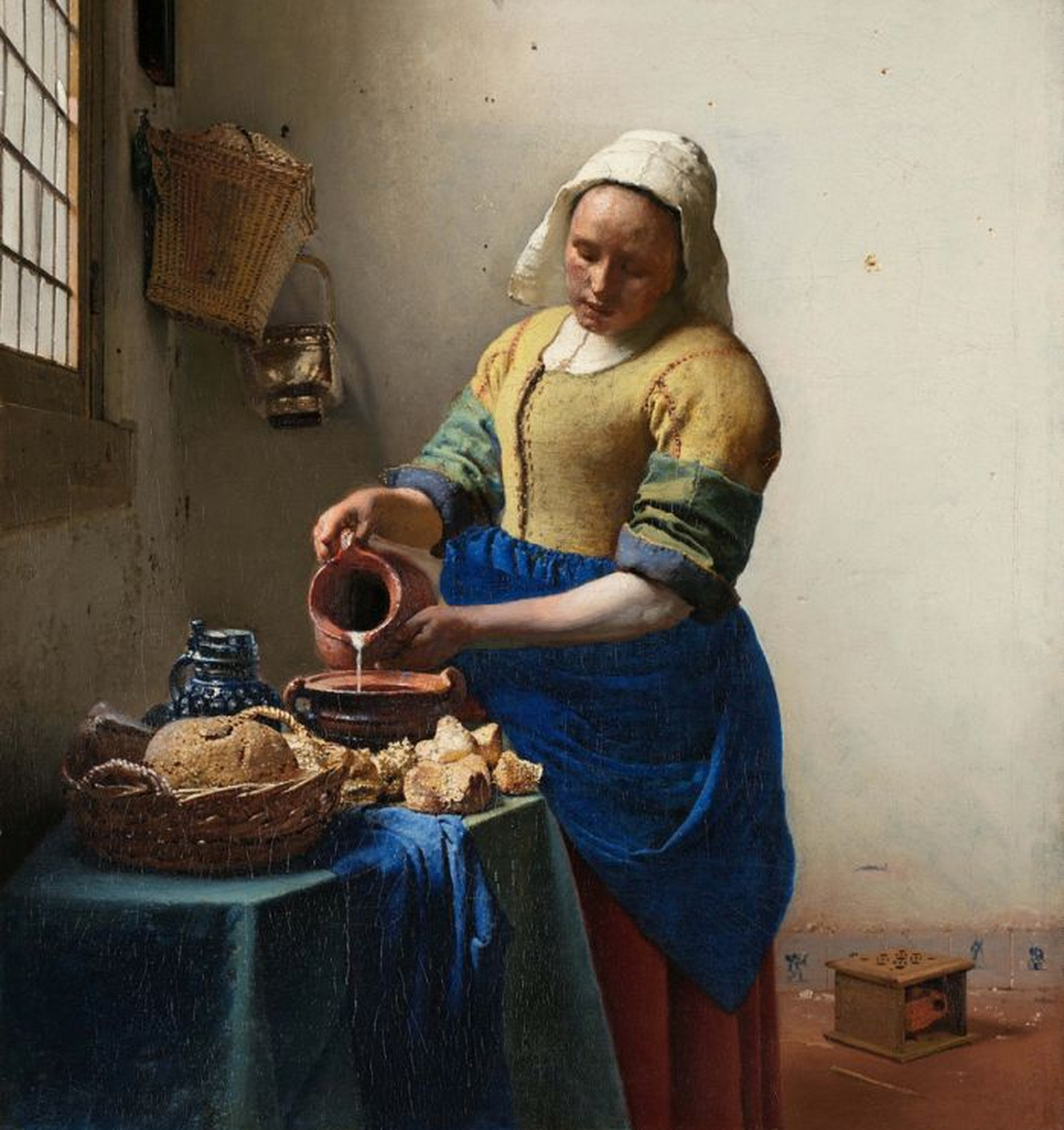 世界名画欣赏(28) 作品:倒牛奶的女佣  作者:维米尔 荷兰  材质:布面