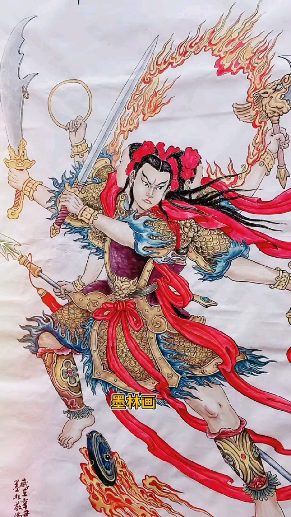 我们的英雄,小哪吒!三头六臂,脚踩多只风火轮,红红火火咯样子.