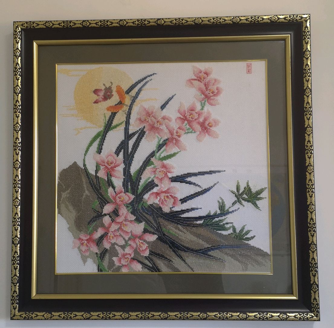金针绣出两幅美画