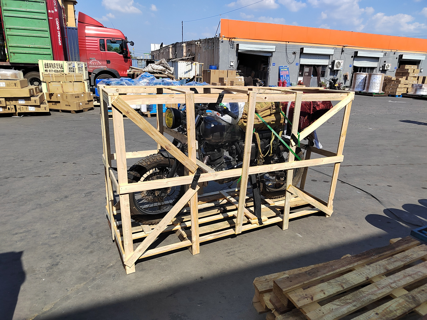 济南摩托车托运物流公司 济南安路物流专业运输摩托车,摩托车打木架