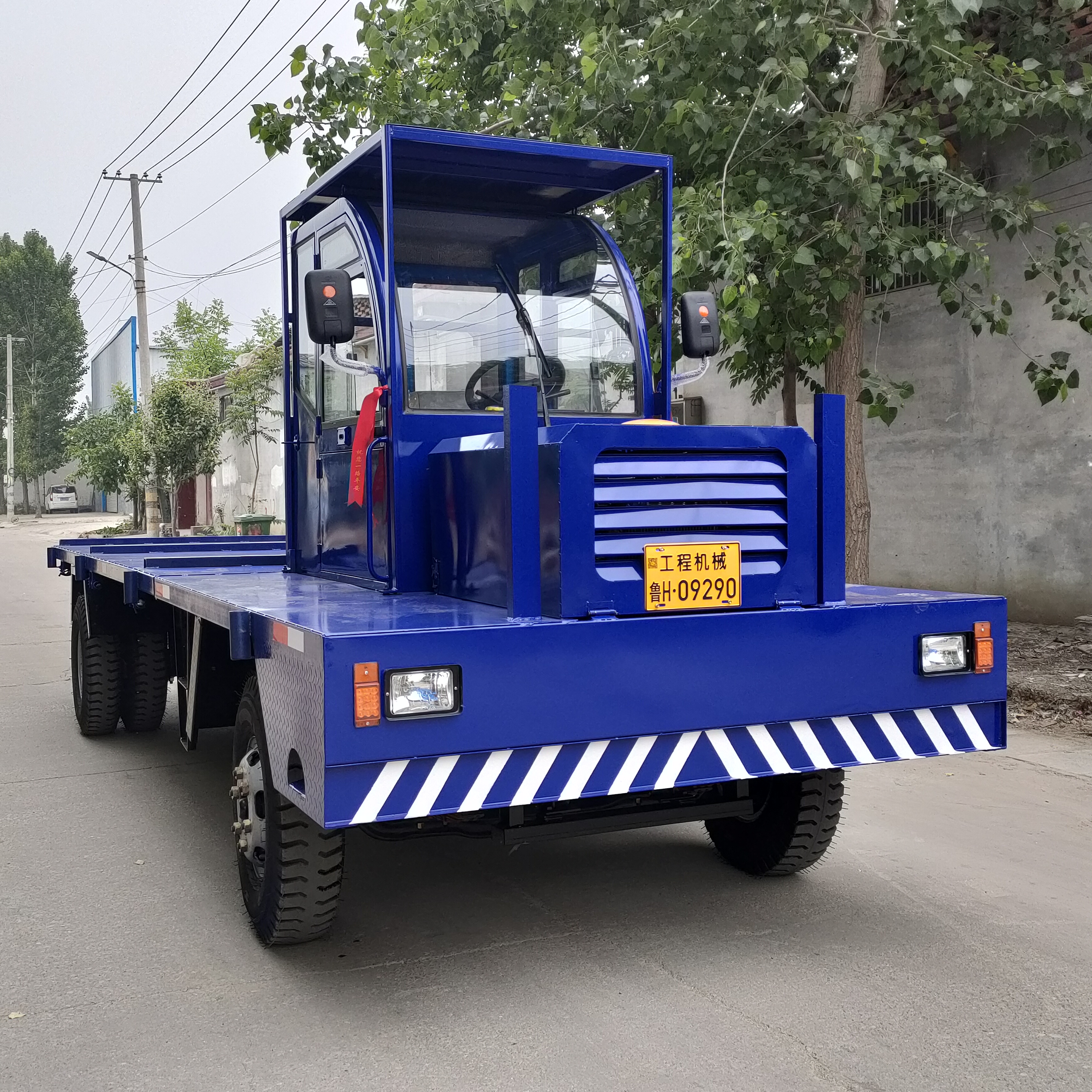 10吨拉钢筋四不像车 四驱液压中置驾驶两边侧翻拉钢筋平板运输车