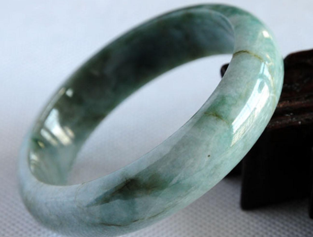 飘蓝花翡翠的来历,竟和宋美龄的"段家玉翡翠手镯"有关!