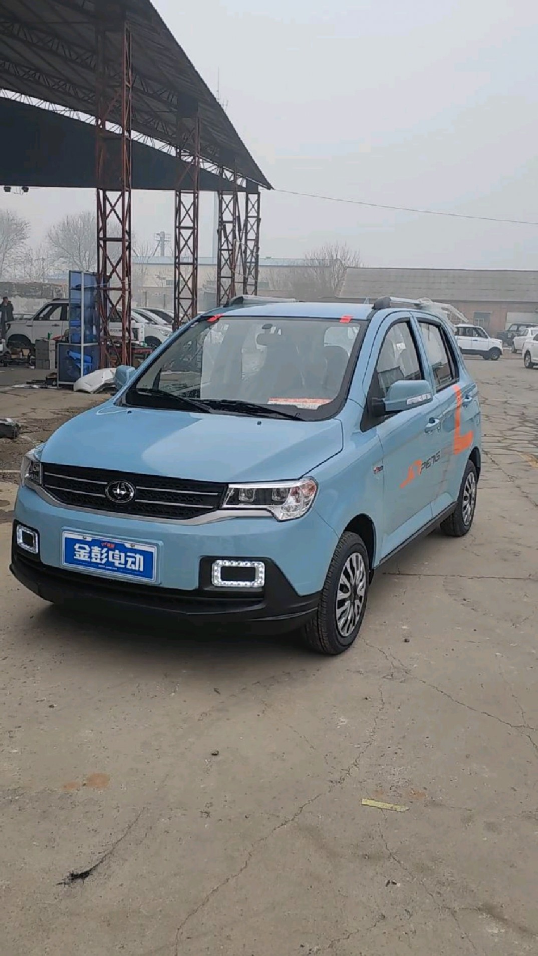 雾霾蓝色金彭d90电动四轮车