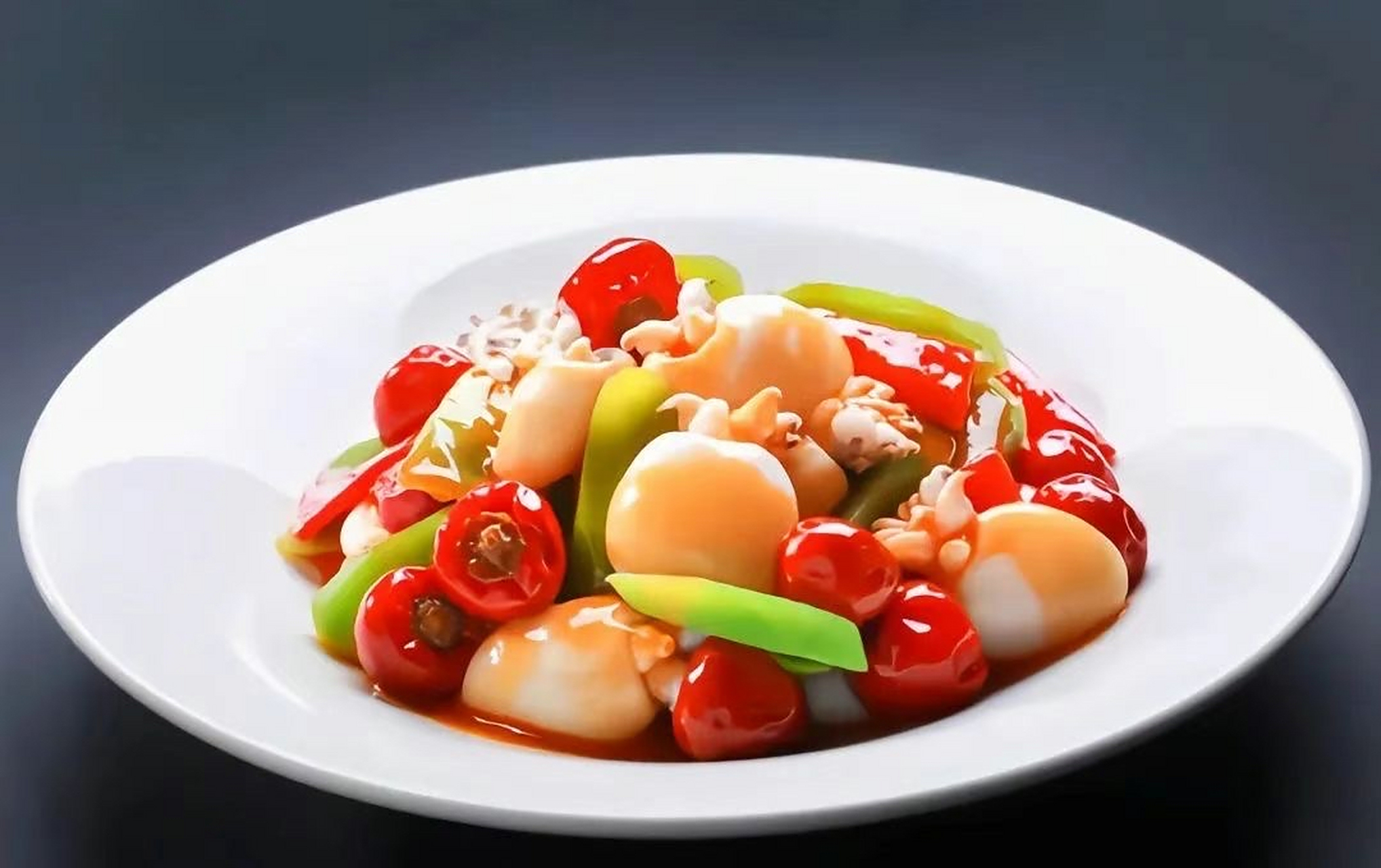 泡椒墨鱼仔 【菜品概述】首创海鲜川做,荣获"首届中国名菜"大奖,实至