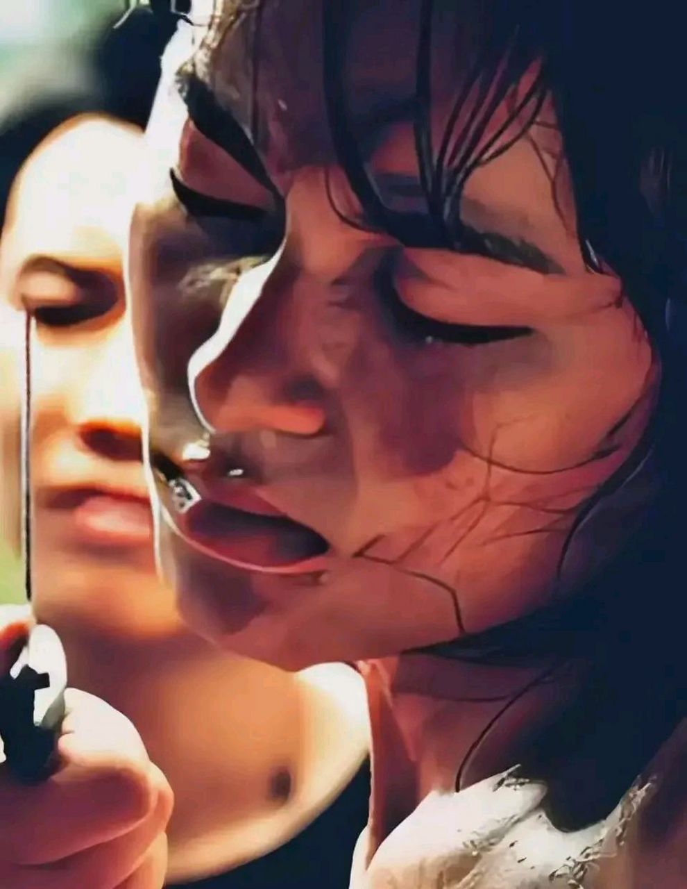 1928年的桑植城,城门楼上挂着一个血淋淋的人头,旁边是一个浑身是血的