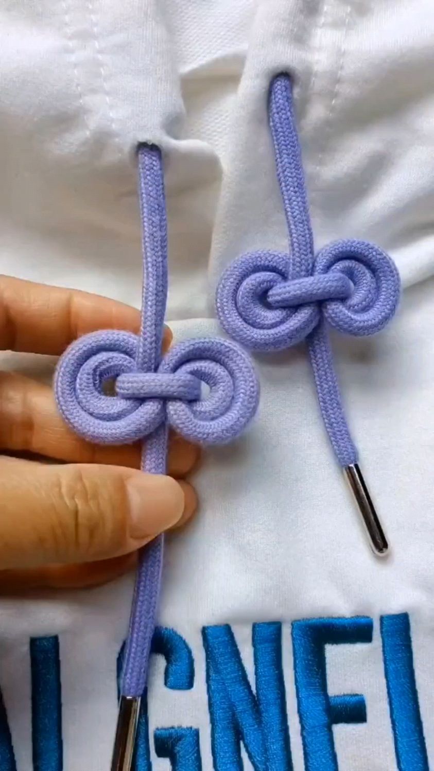 卫衣绳打结方法 卫衣带子