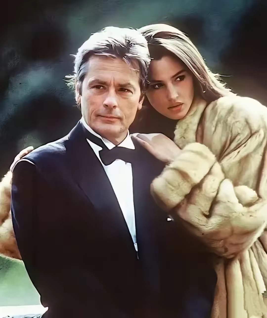 这是世界上最帅的男士和世界上最美的女性一张照片阿兰德龙在1989年